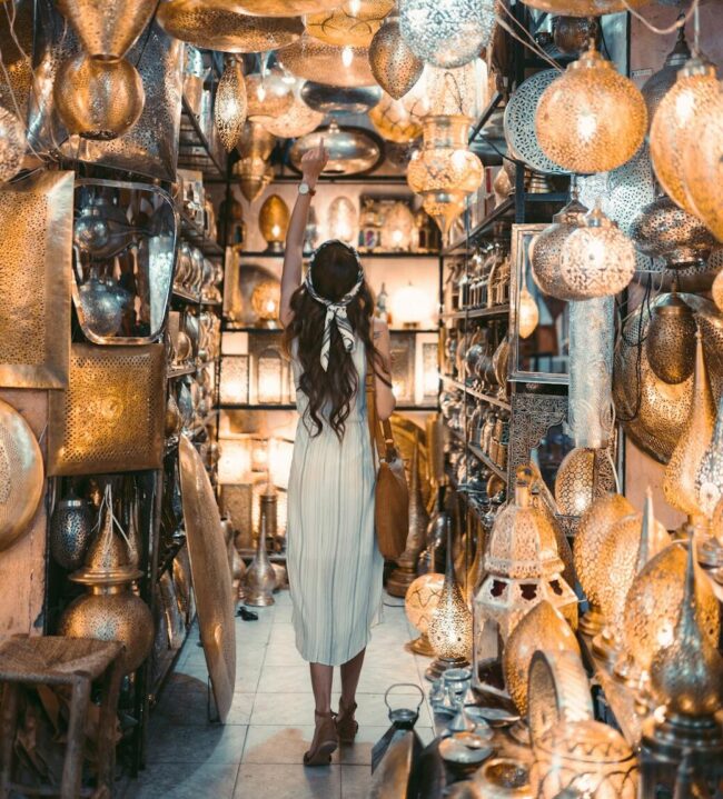 woman in white dress standing inside a store
